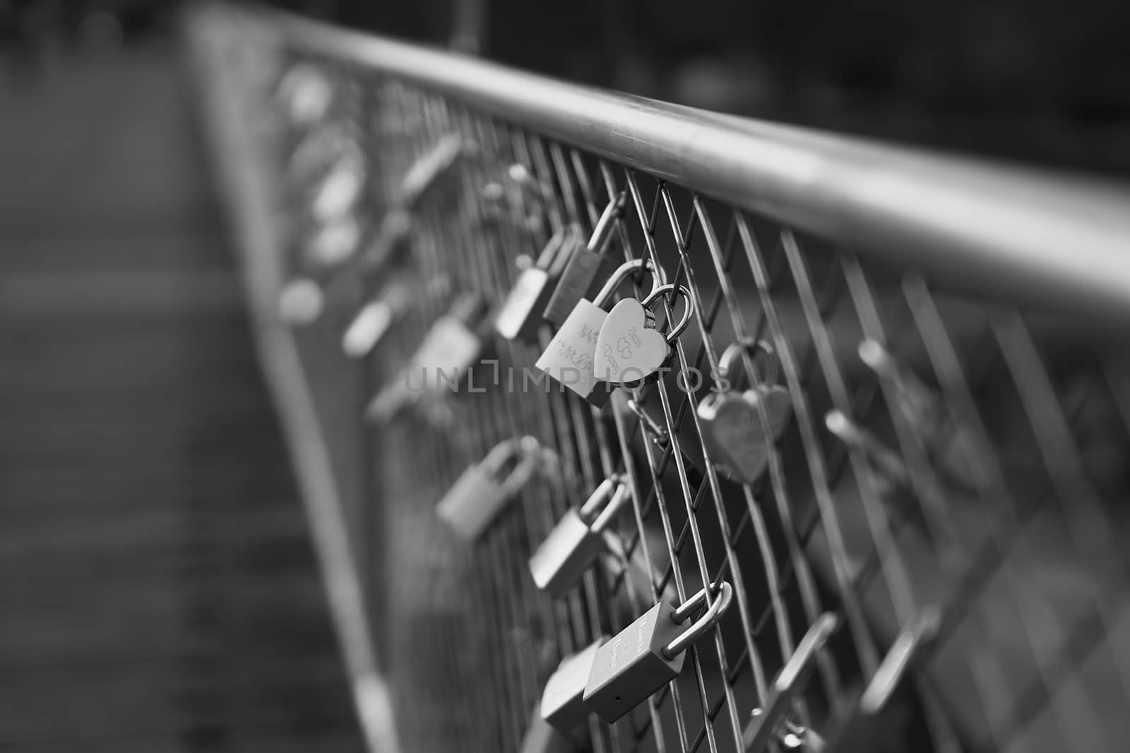 Heart shaped padlock on bridge in Munich Germany
