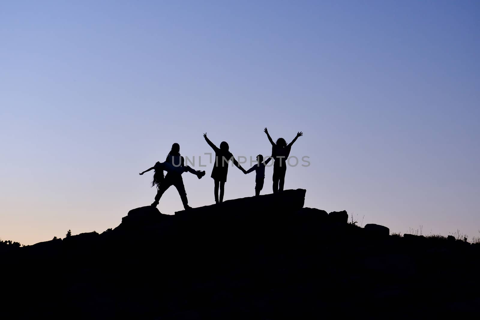 family hiking in the mountains