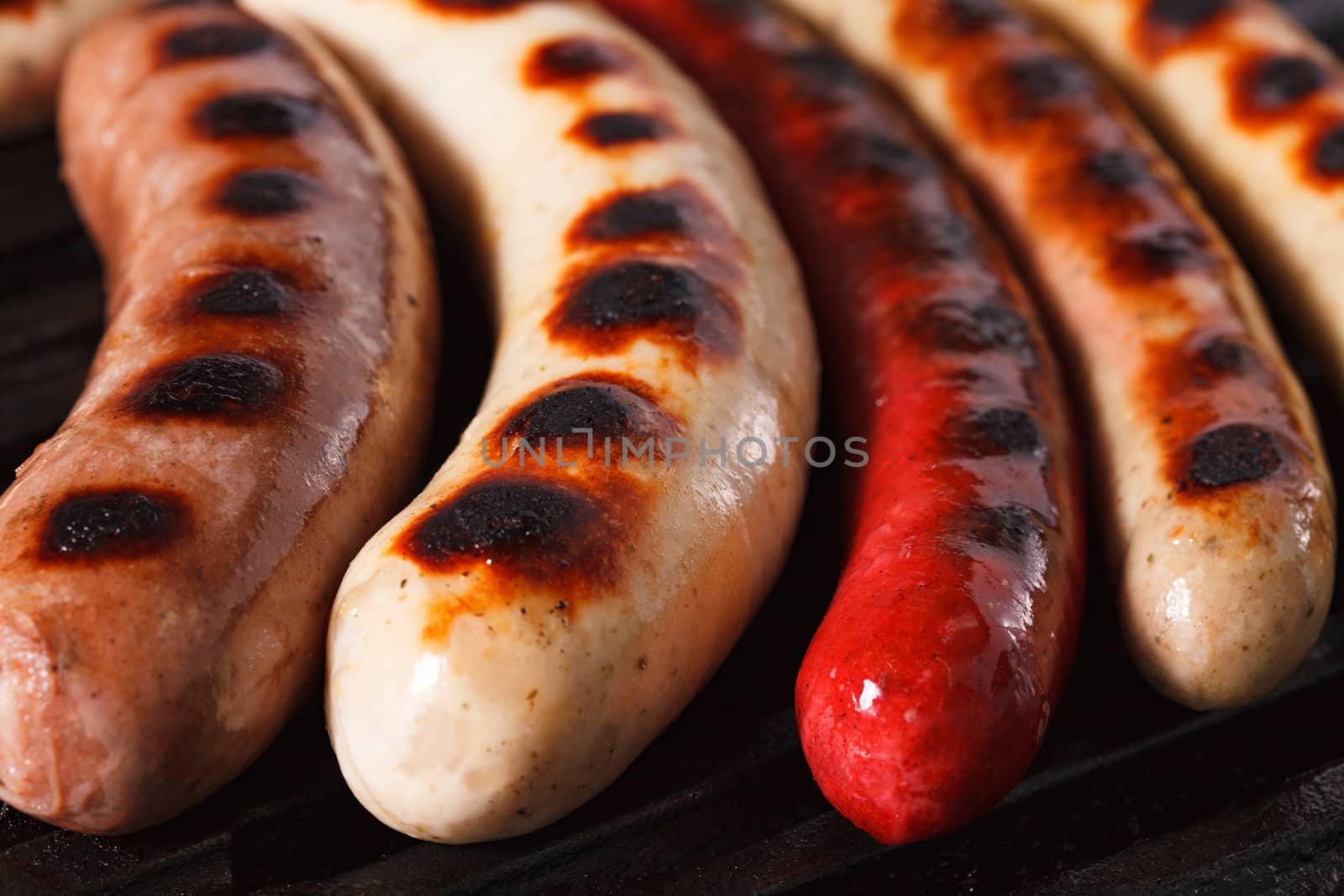 Closeup shot of sausages on a grill