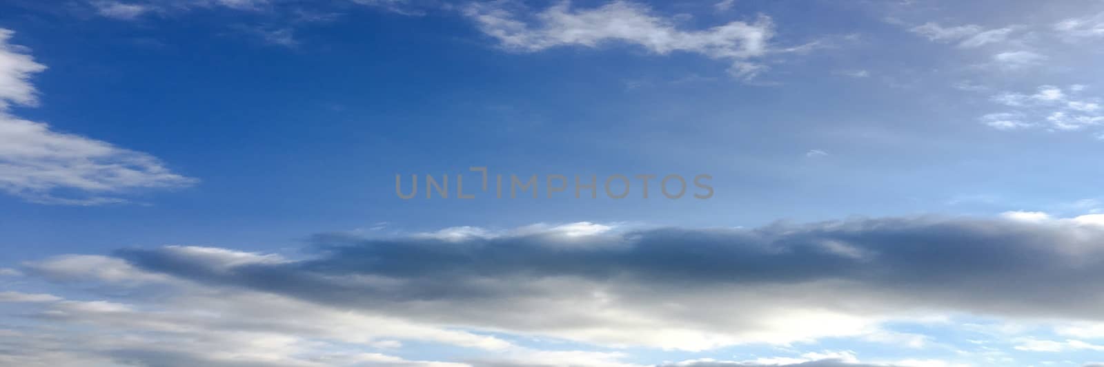 beautiful blue sky with clouds background.Sky with clouds weather nature cloud blue.Blue sky with clouds and sun. by titco