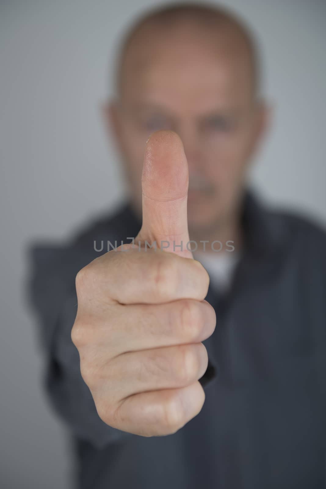 a man pointing his finger forward