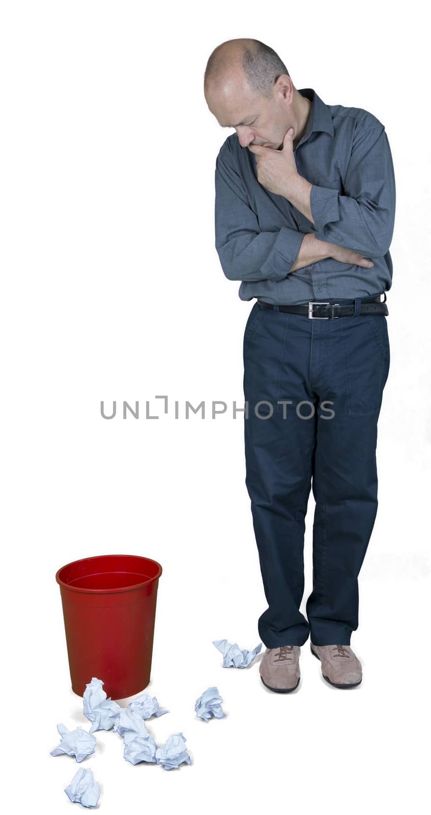 a man and a wastebasket