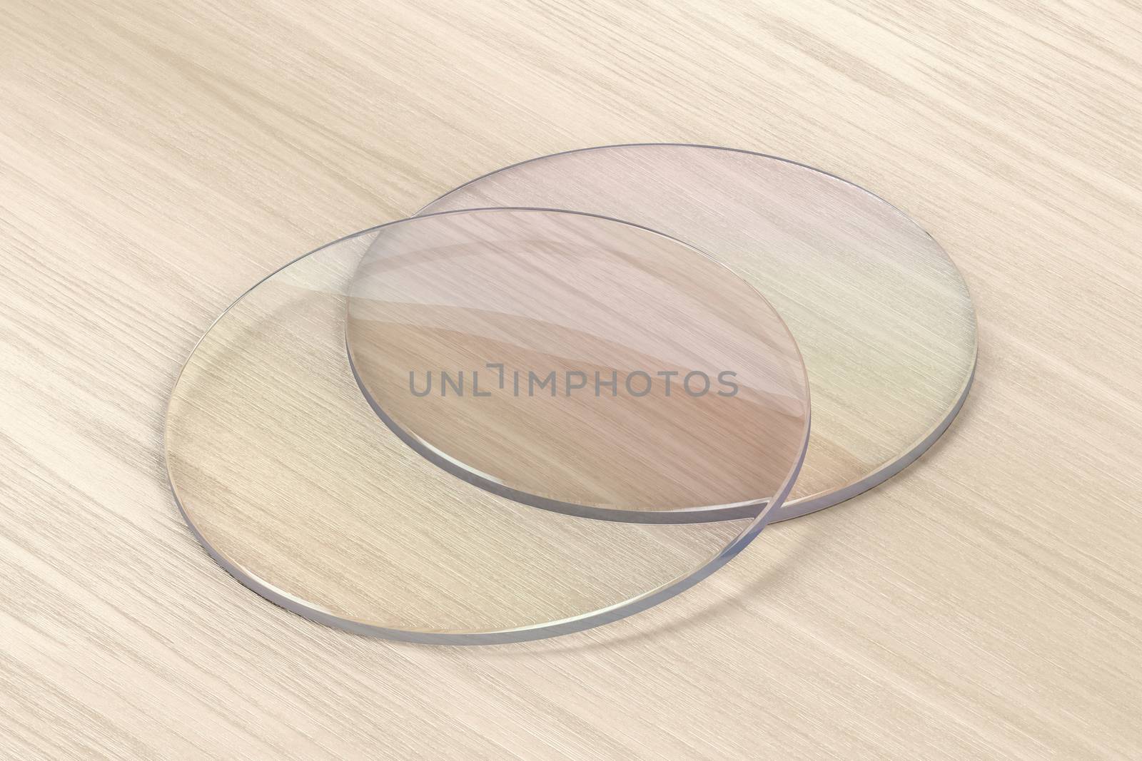 Pair of eyeglasses lens on wood background