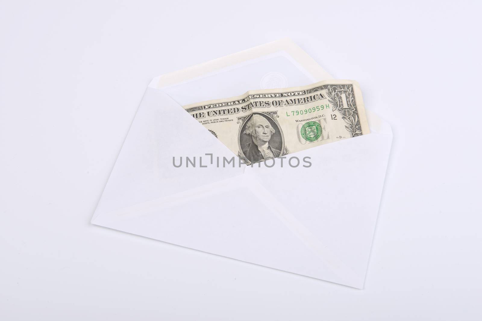a dollar inside a white envelope