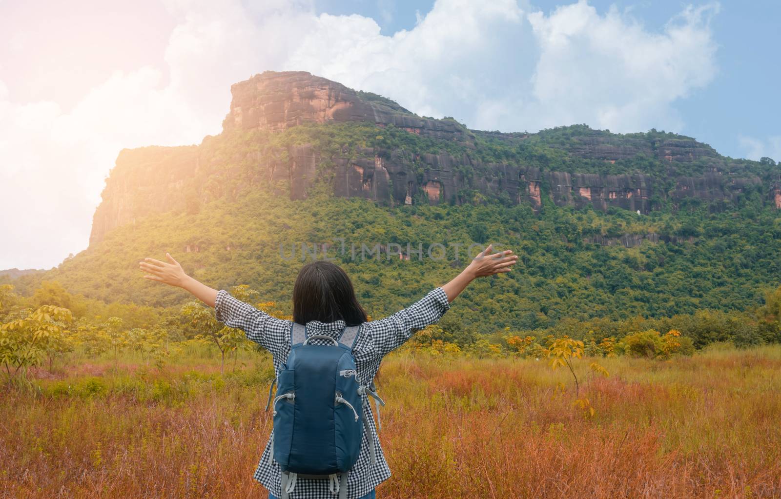 Asian woman backpacker enjoy the view at mountain