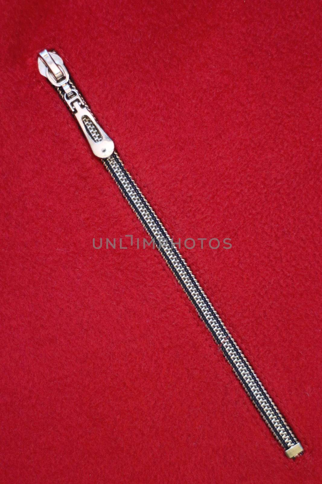 closed pocket zipper on a red background