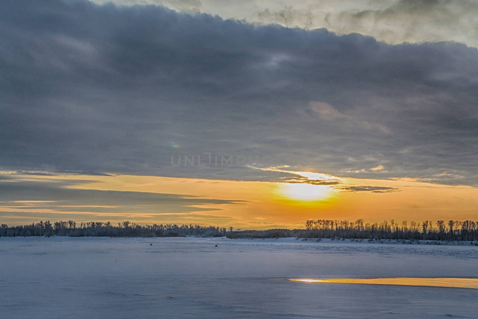 sunset on the river in winter river Dec frozen water forest