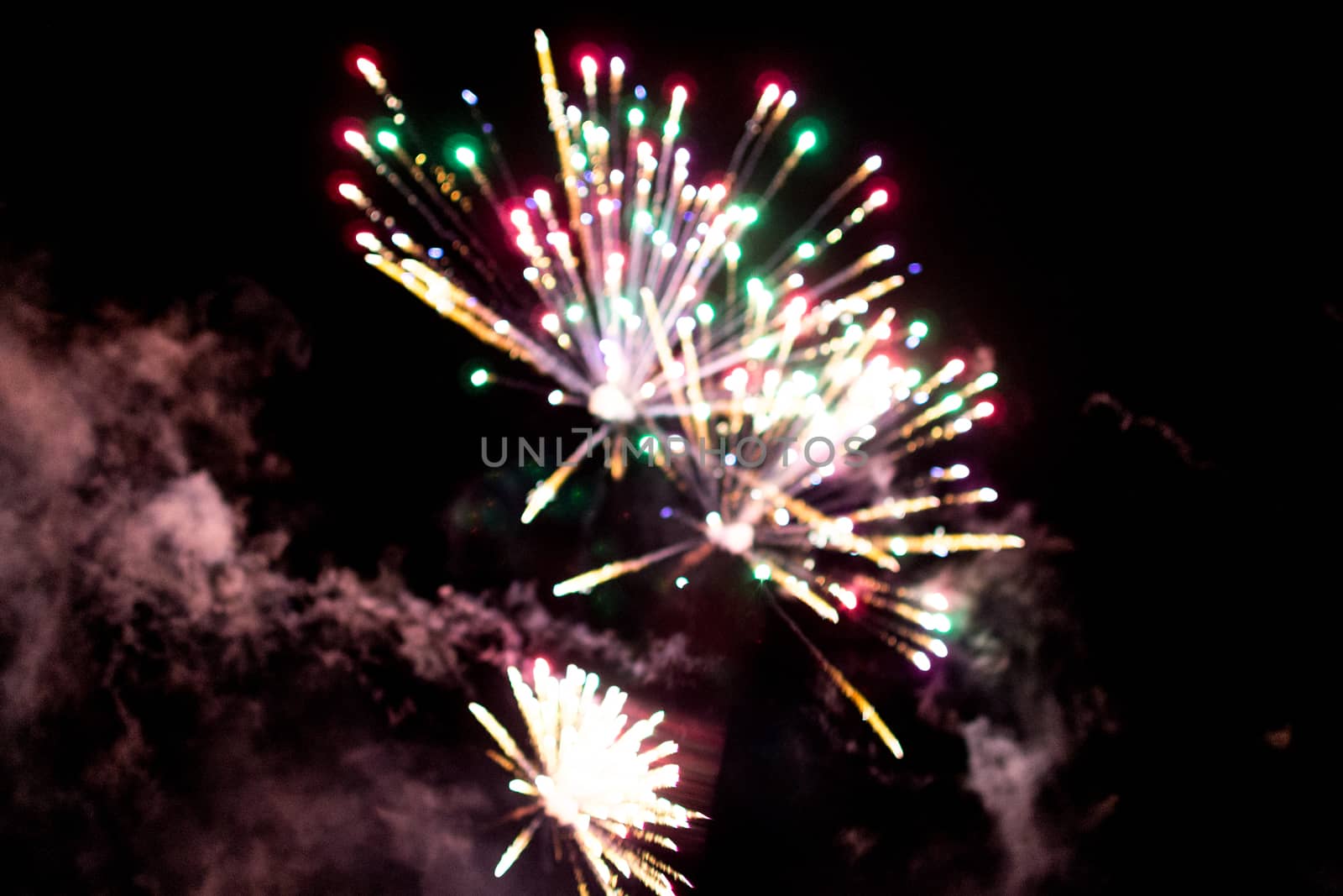 fireworks out of focus bokeh beautiful explosion on black background