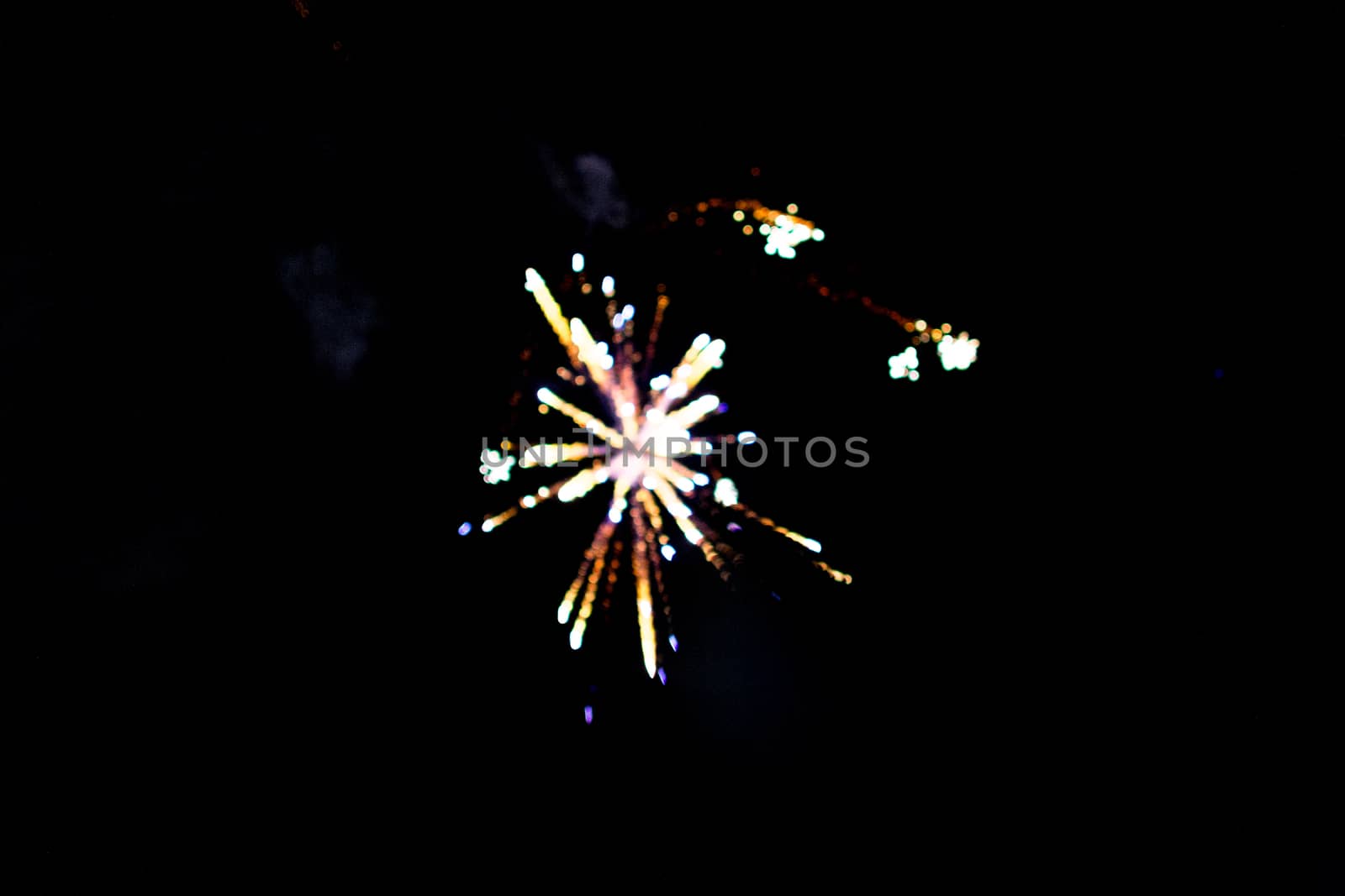 fireworks out of focus bokeh beautiful explosion on black background