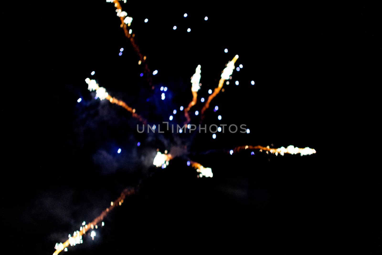 fireworks out of focus bokeh beautiful explosion on black background