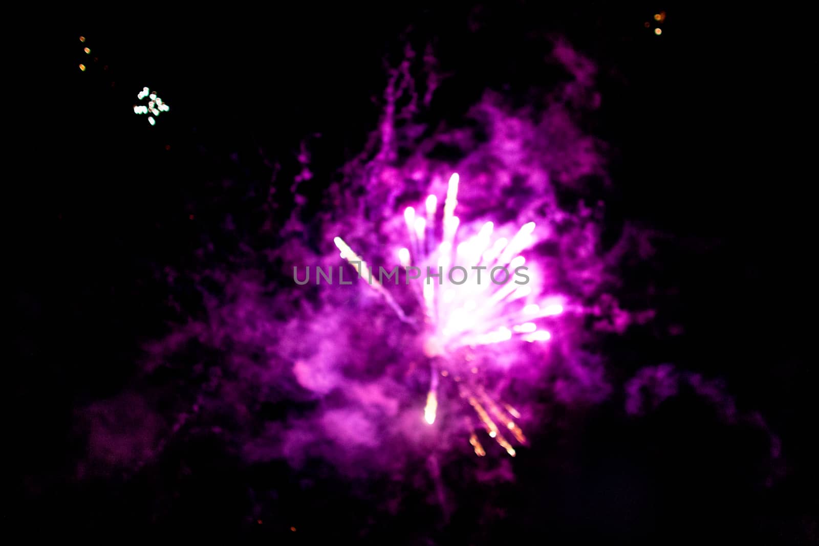 fireworks out of focus bokeh beautiful explosion on black background