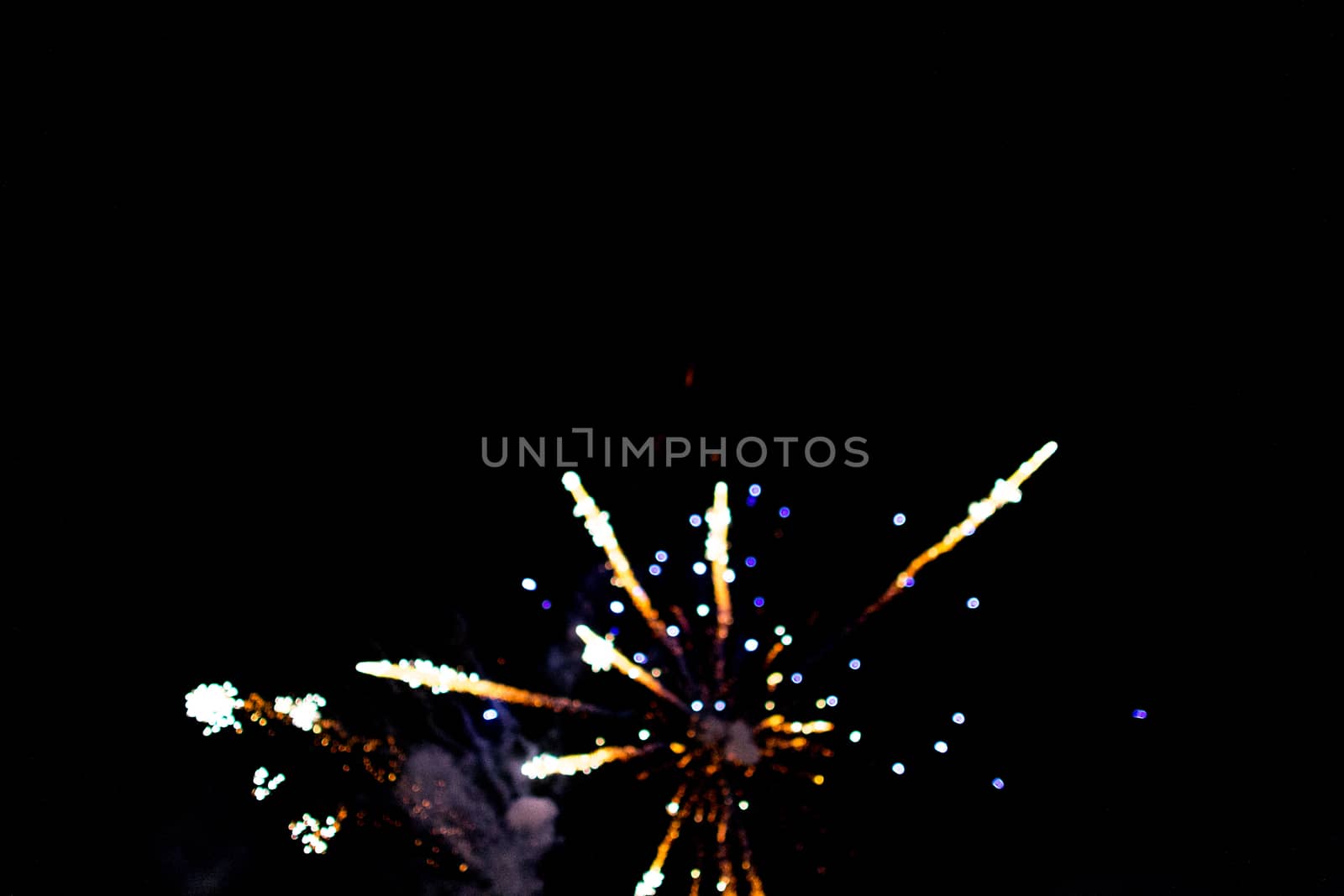 fireworks out of focus bokeh beautiful explosion on black background