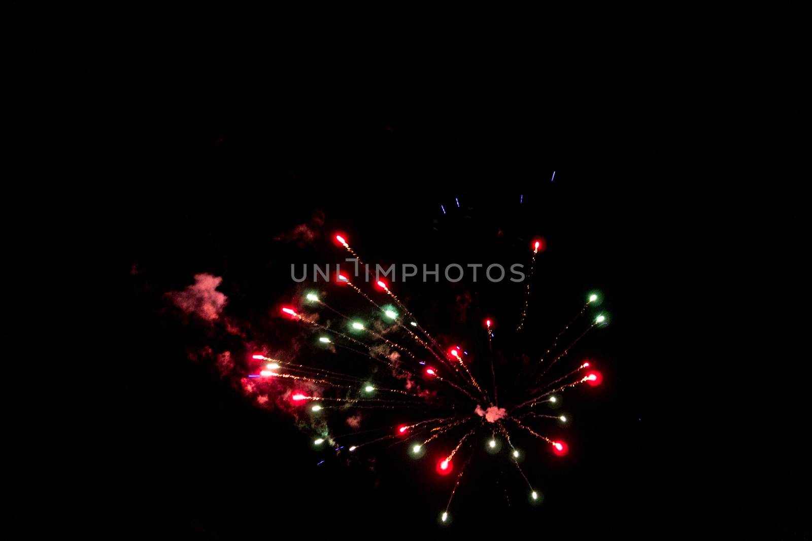 fireworks explosion of color on a dramatic black background focus