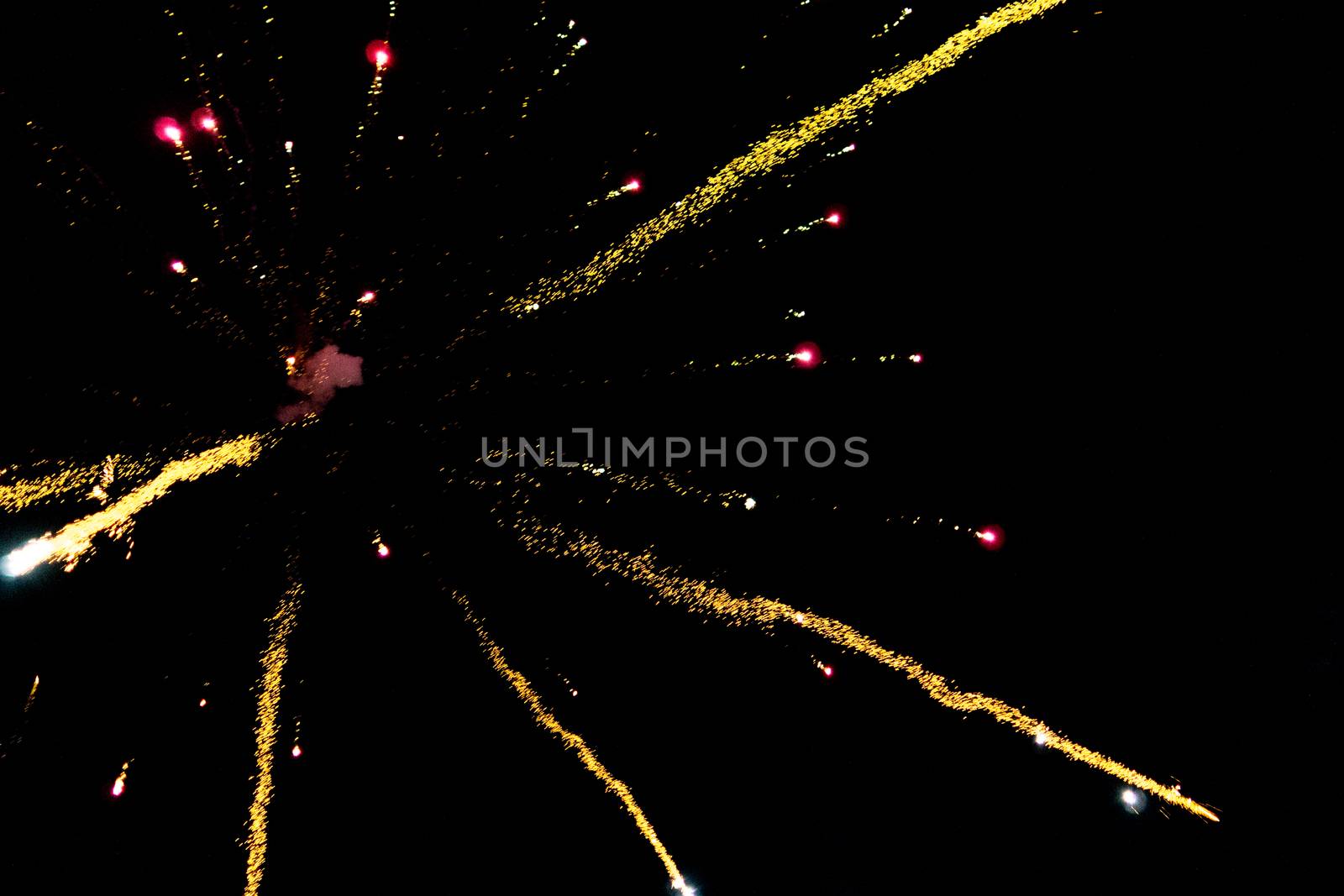 fireworks explosion of color on a dramatic black background focus