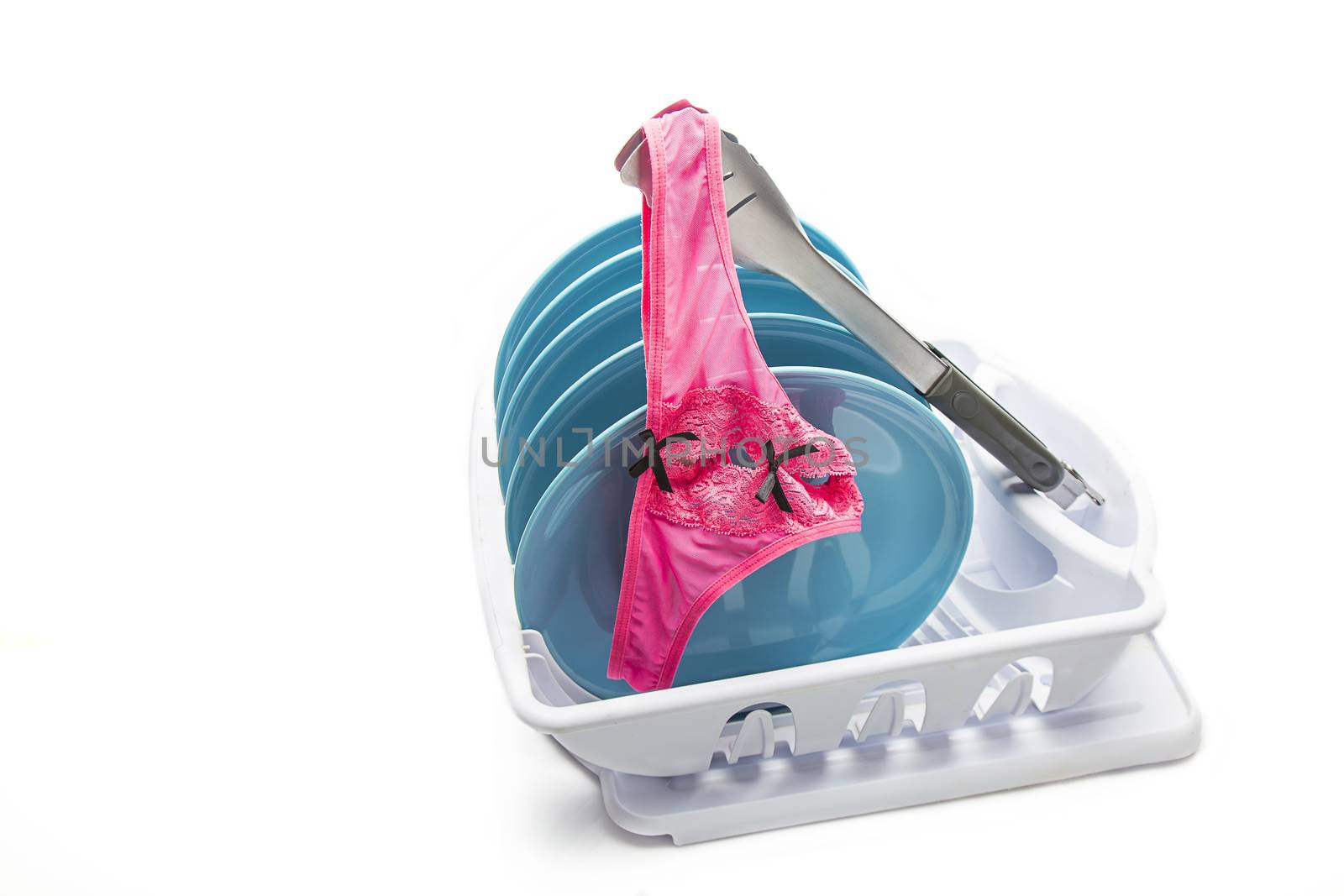 pink lace panties on a dishes rack