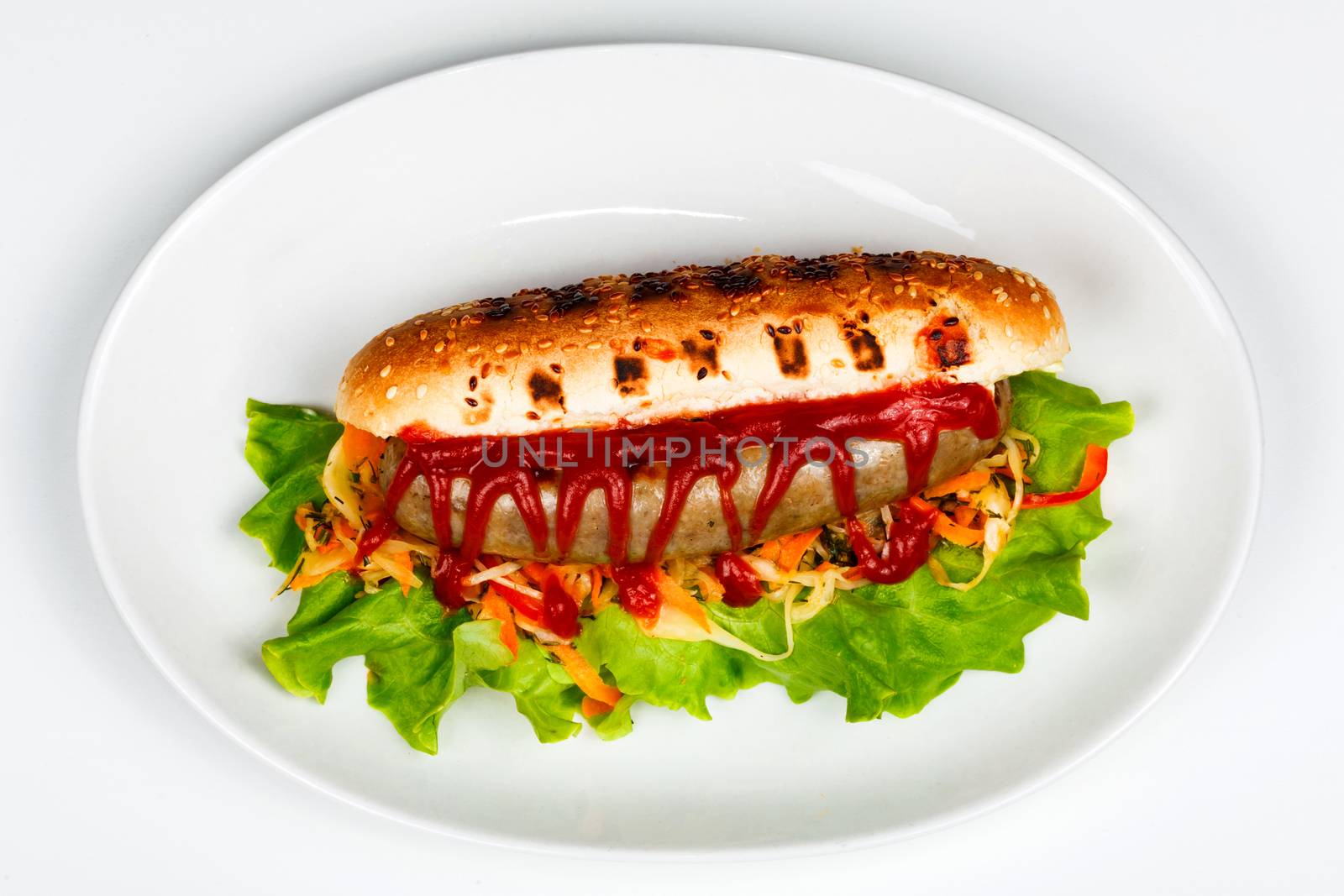 Closeup shot of a hot dog on a plate by Nobilior