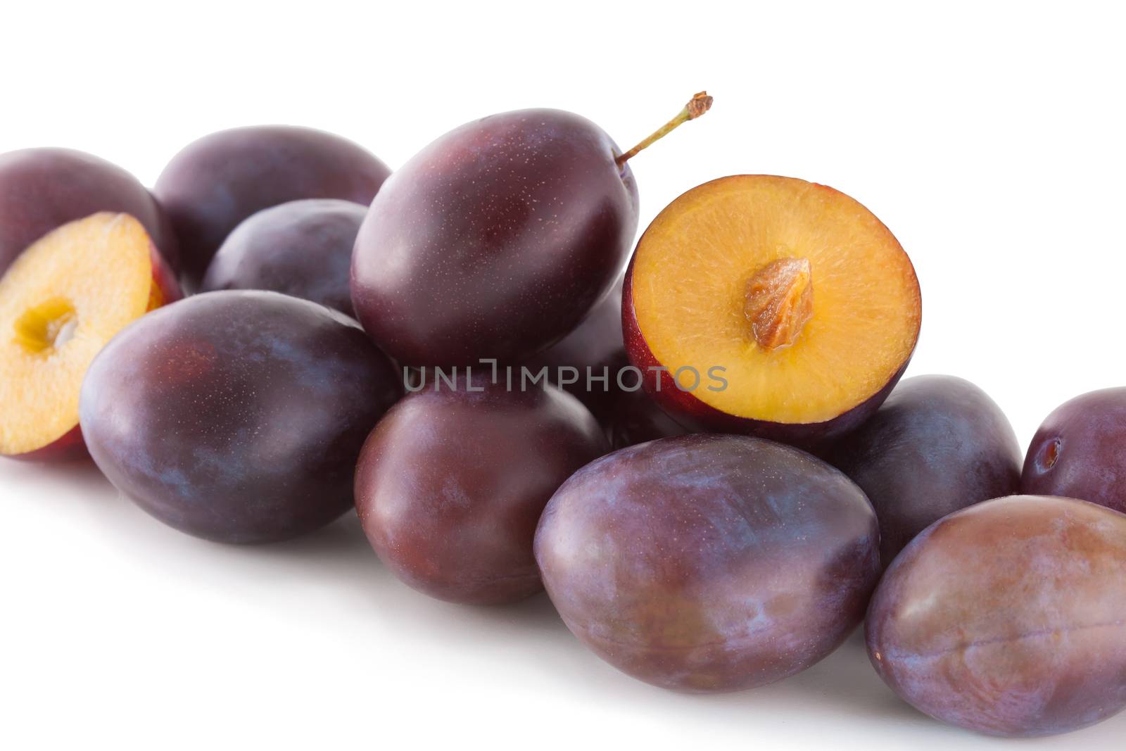 Fruits, plums isolated on white