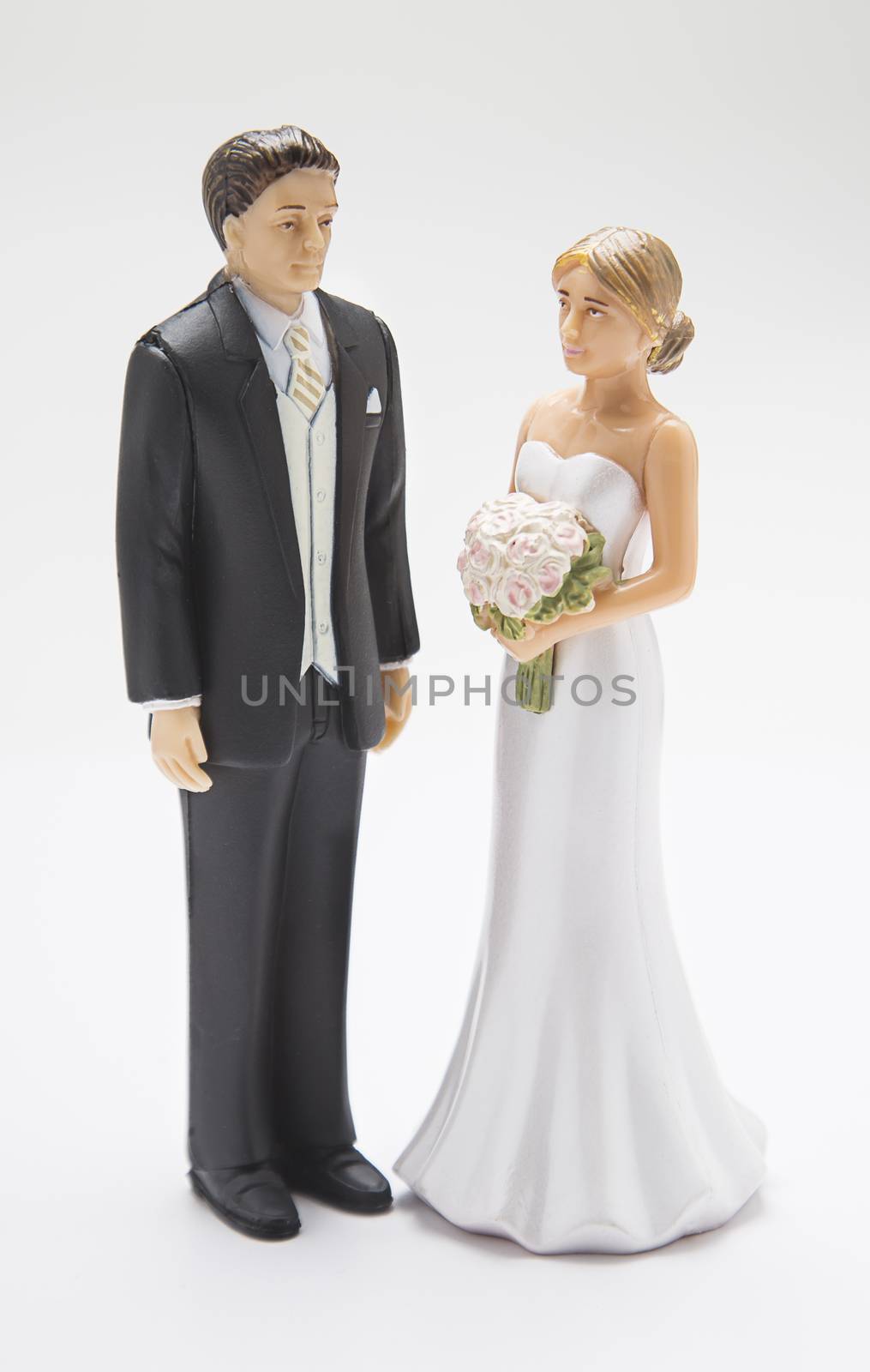 man & woman wedding cake topper