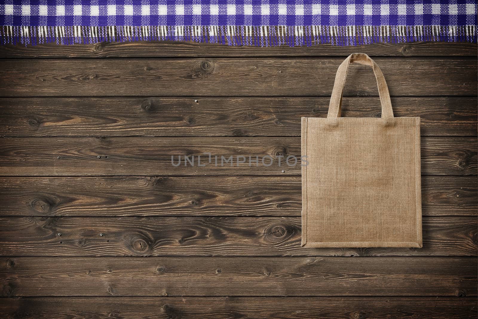 eco bag for shopping on wooden background