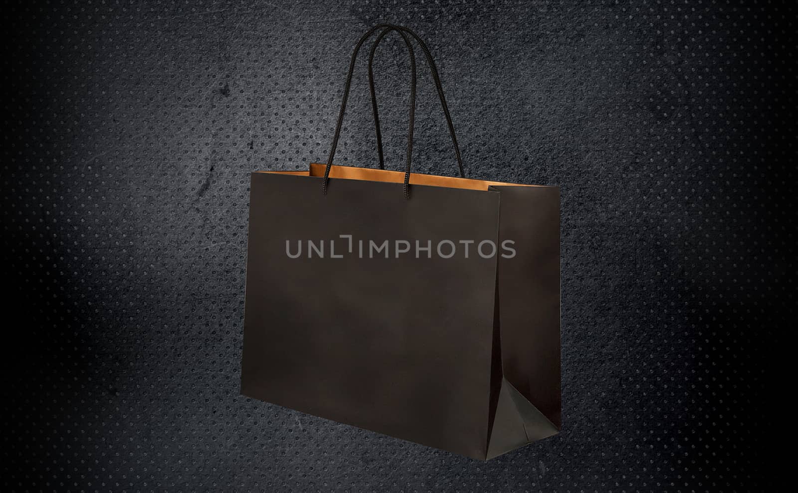 paper bag for shopping on a dark background