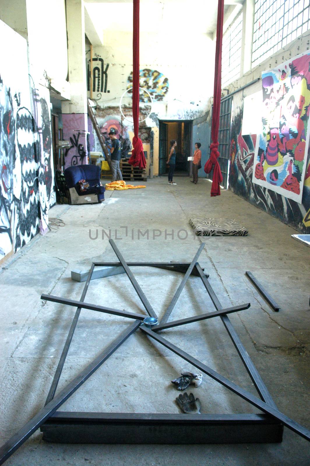 Colorful spacious art studio with many drawings