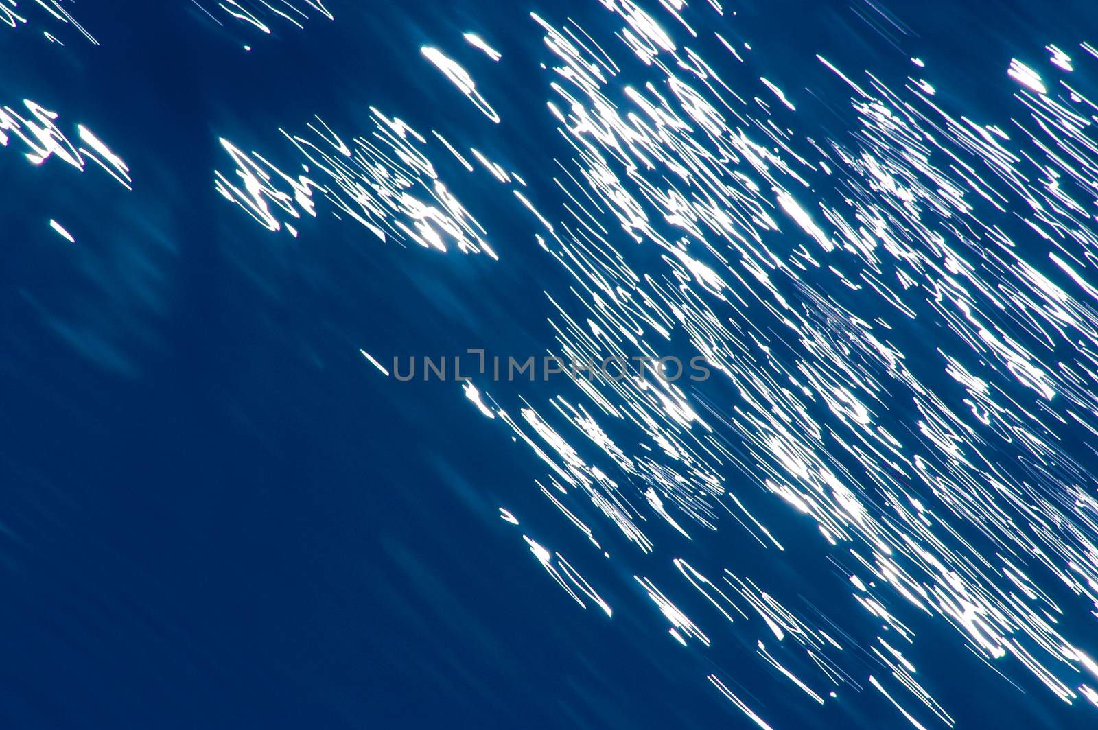 Blurred blue, white and blue diagonal background