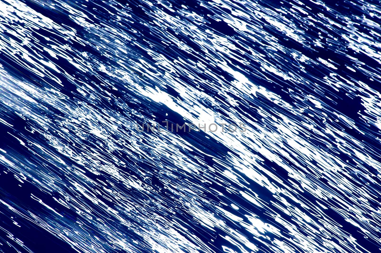 Blurred blue, white and black diagonal background