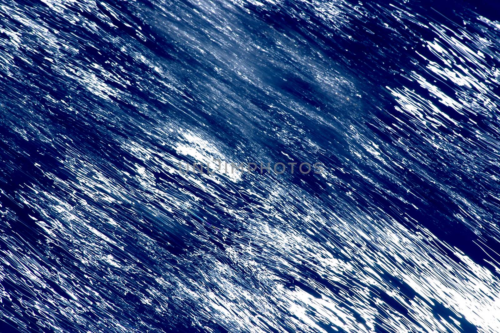 Blurred blue, white and black diagonal background