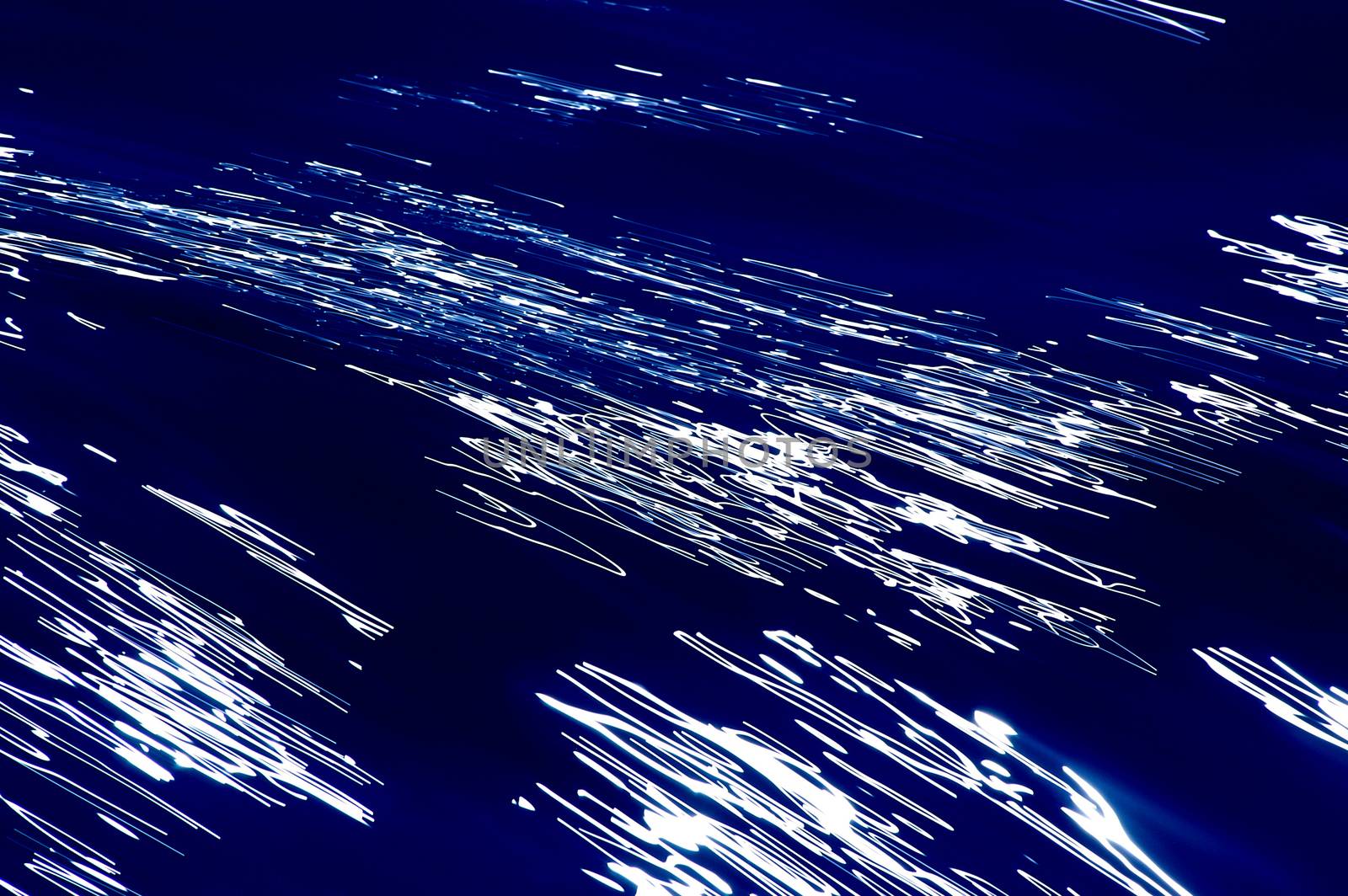 Blurred blue, white and black diagonal background