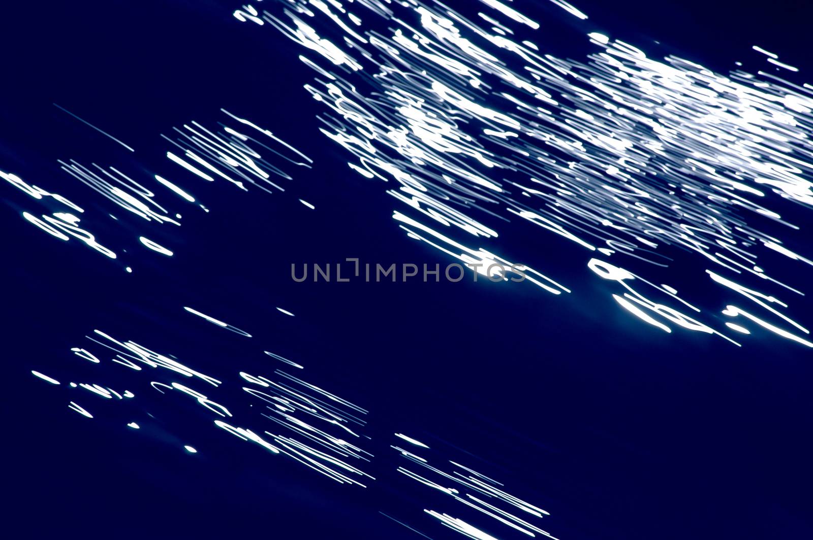 Blurred blue, white and black diagonal background