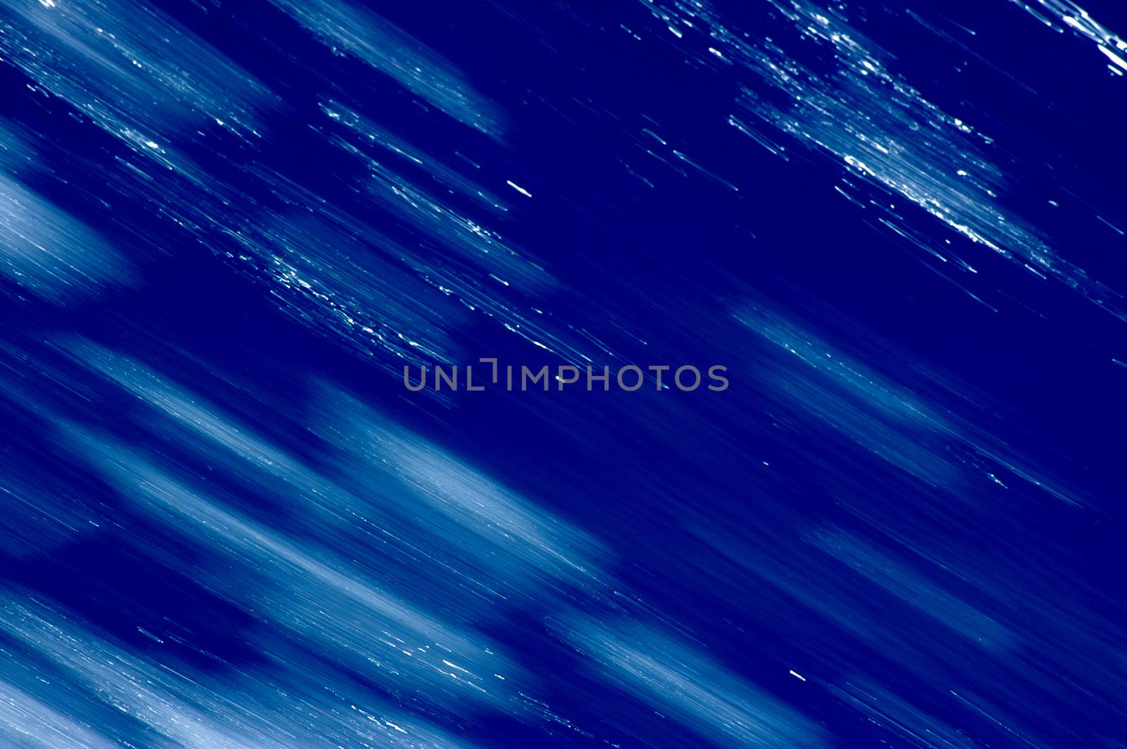 Blurred blue, white and black diagonal background