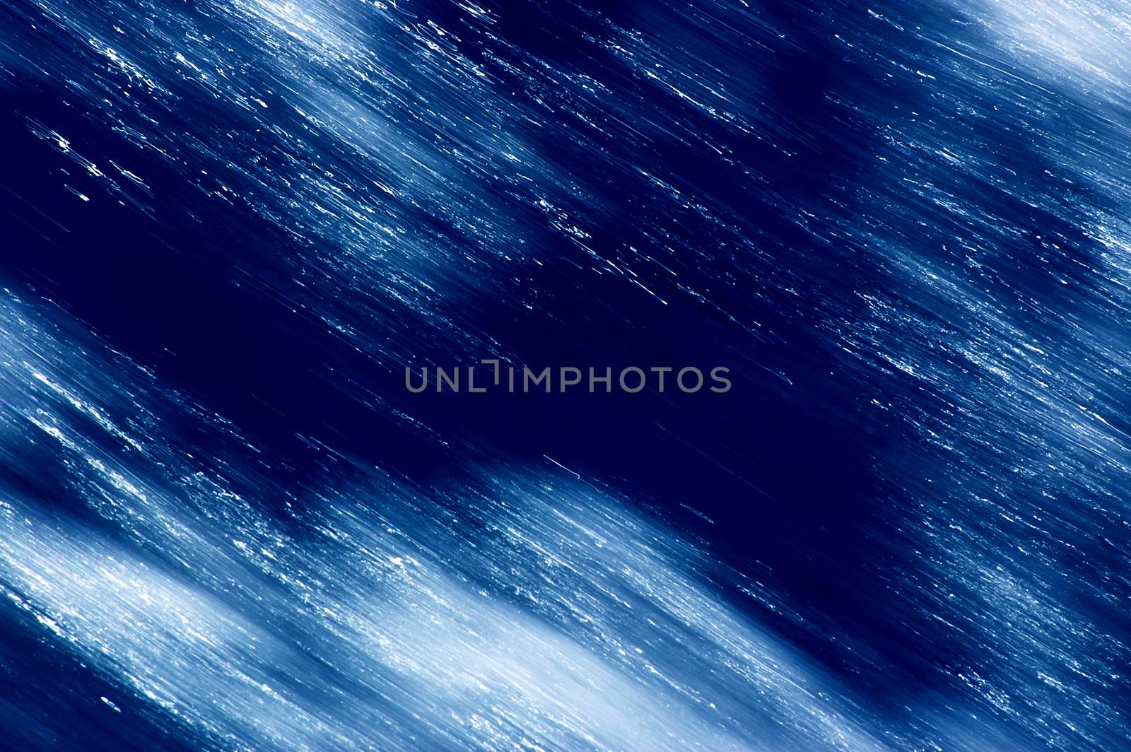 Blurred blue, white and black diagonal background