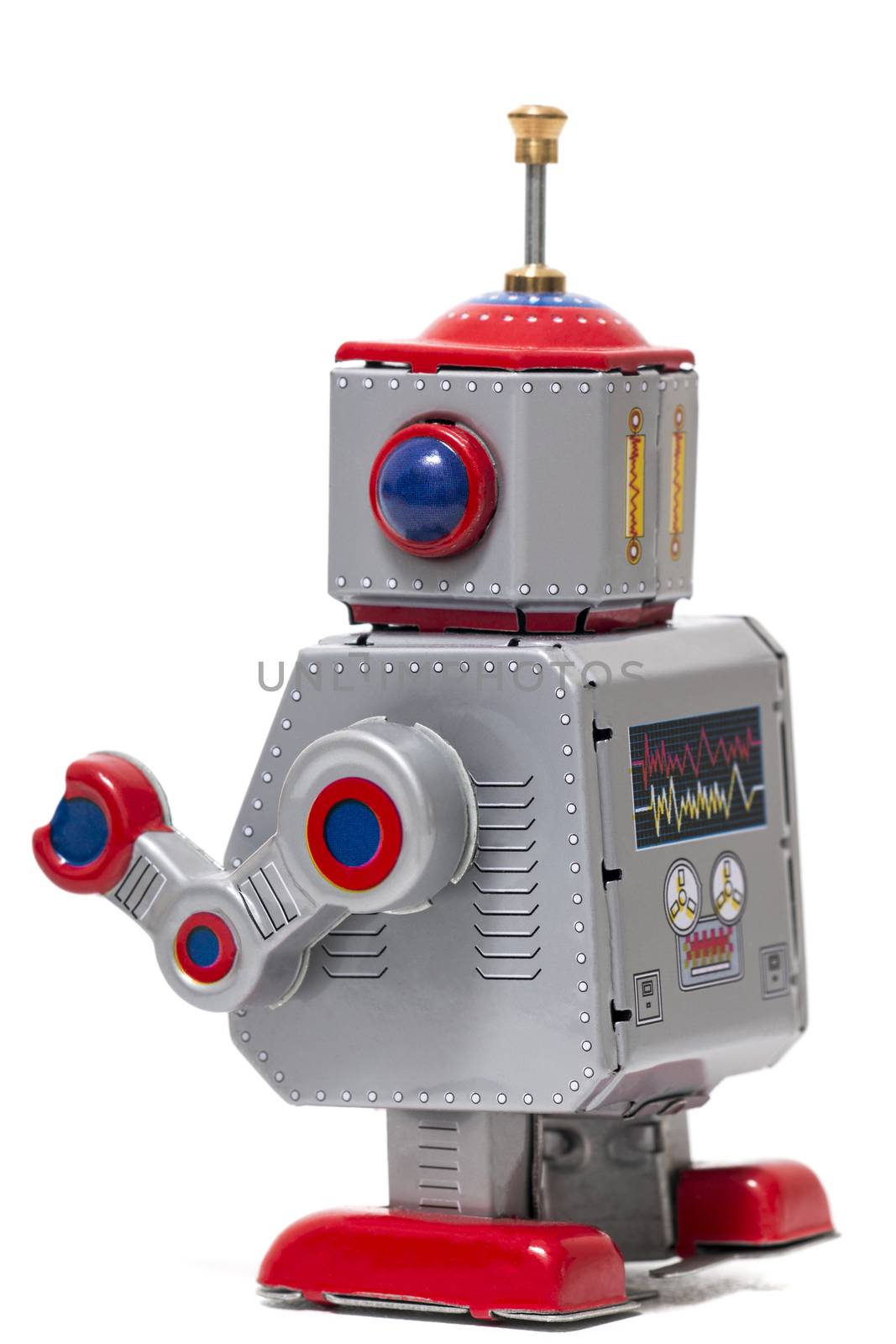 Vintage tin robot toy isolated on a white background.