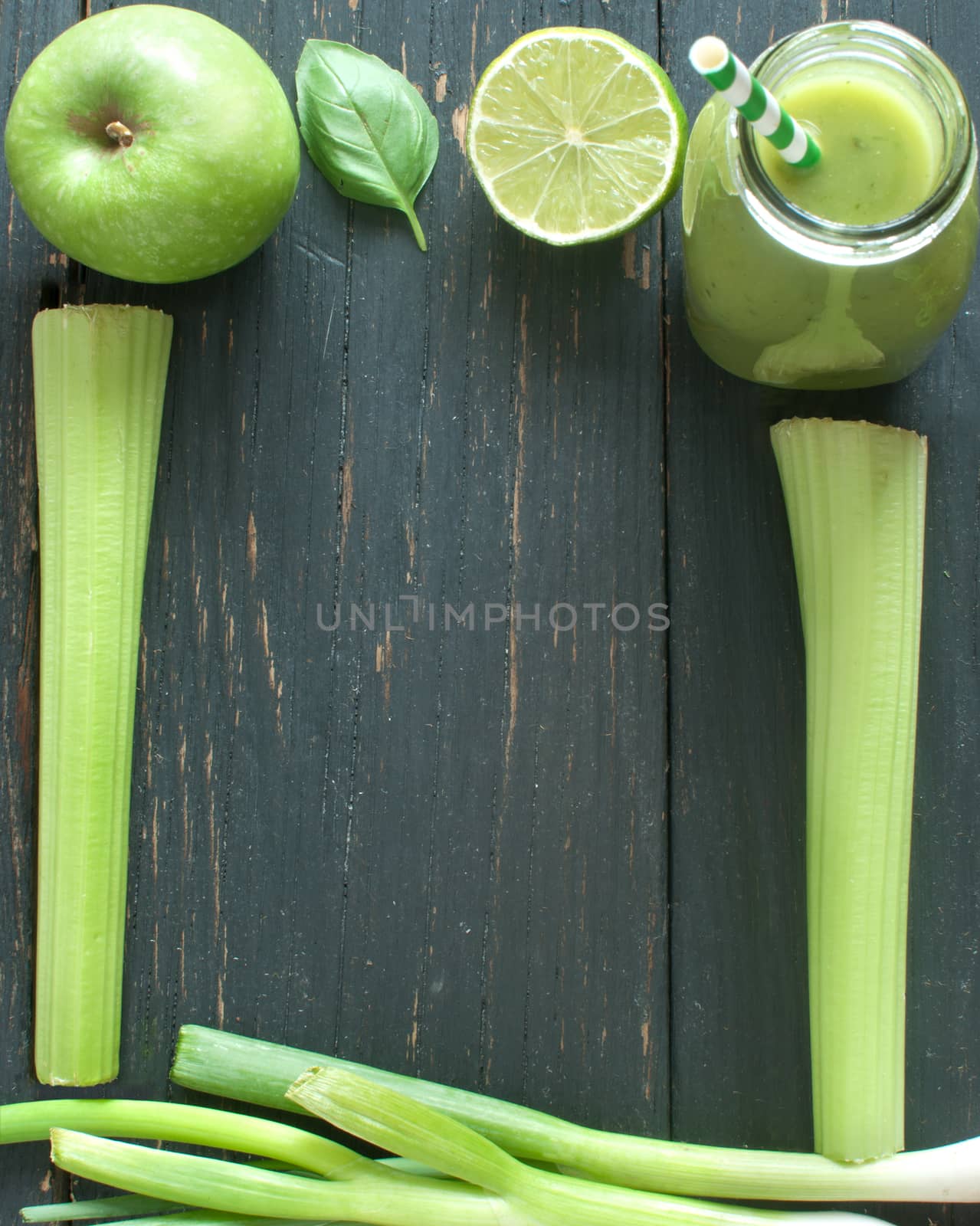 Green juice ingredients frame by unikpix