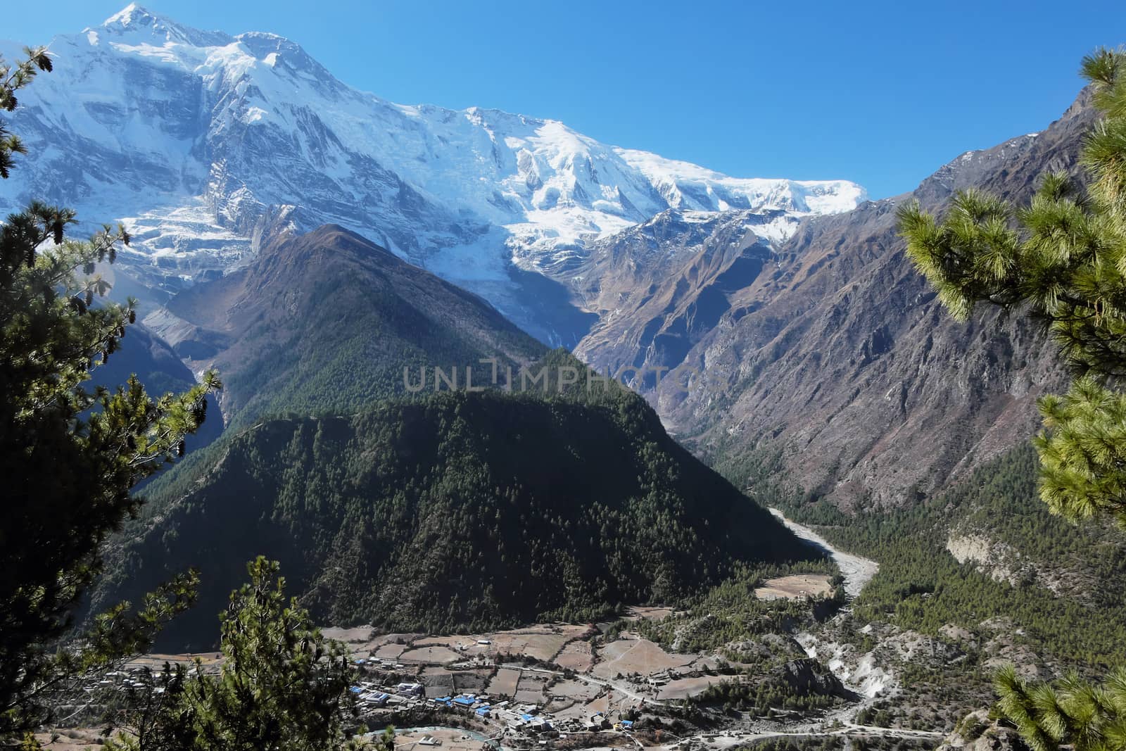 Huge mountain valley in nepal himalayas with mountain annapurna II
