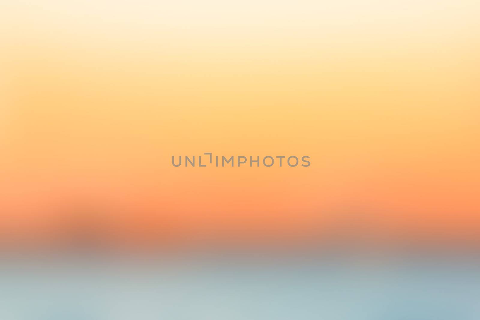 Orange sunset abstract blurred background by sengnsp