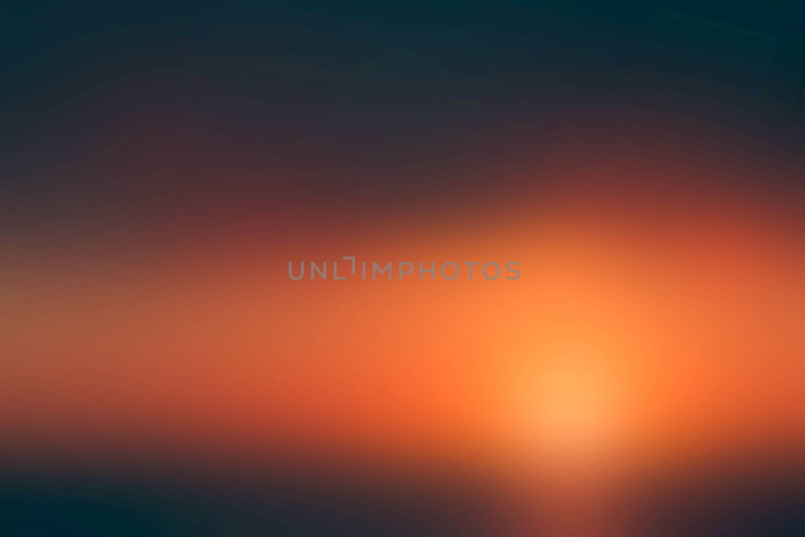 Orange sunset abstract blurred background by sengnsp