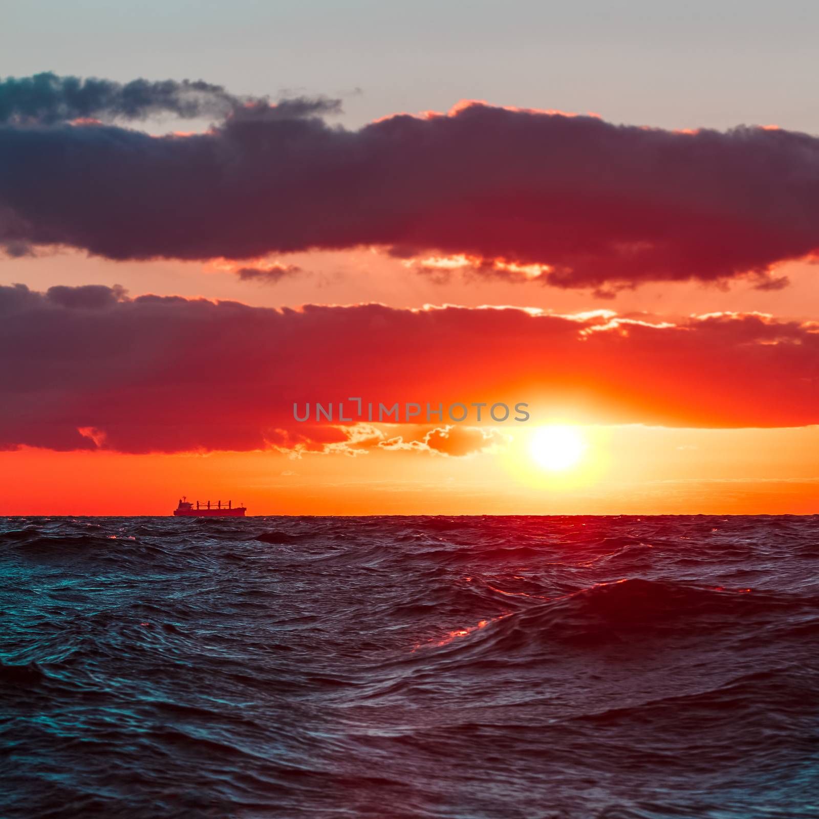 Hot and romantic sunset over the Baltic sea. Calm landscape