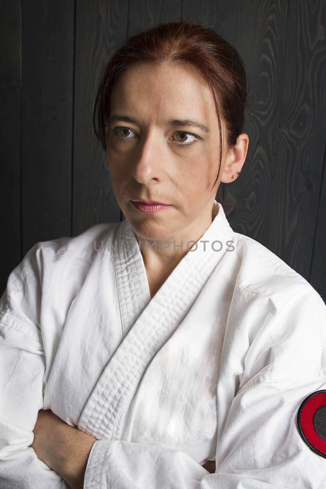 portrait of a forty year old woman wearing a gi