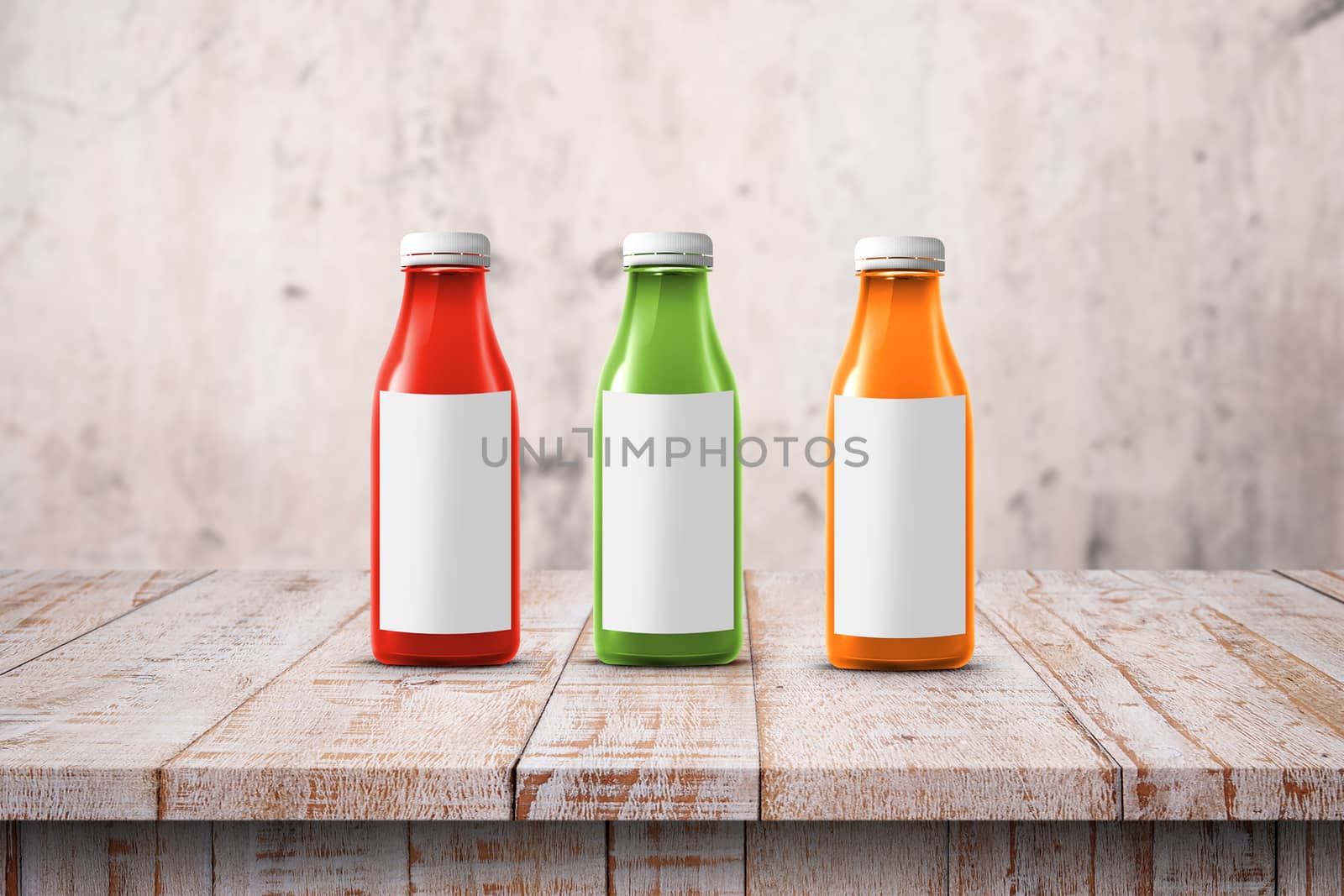 three multicolored bottles of juice are on the counter