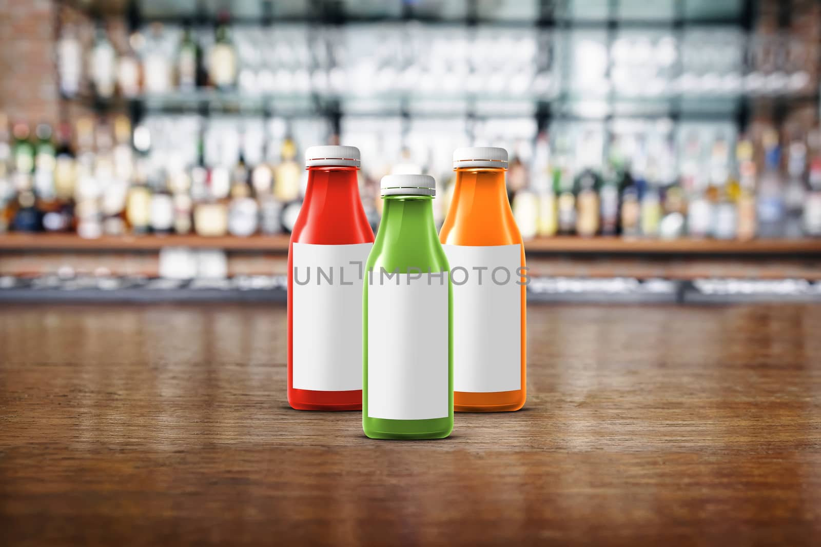 three multicolored bottles of juice are on the counter by boys1983@mail.ru