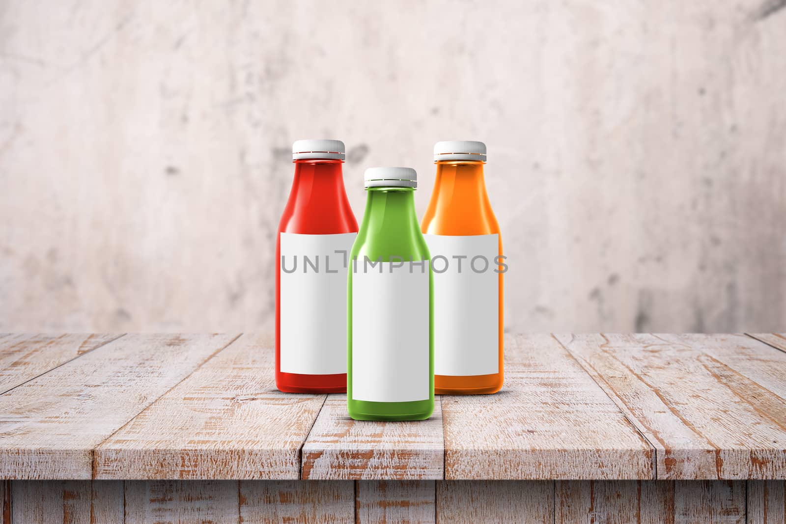 three multicolored bottles of juice are on the counter