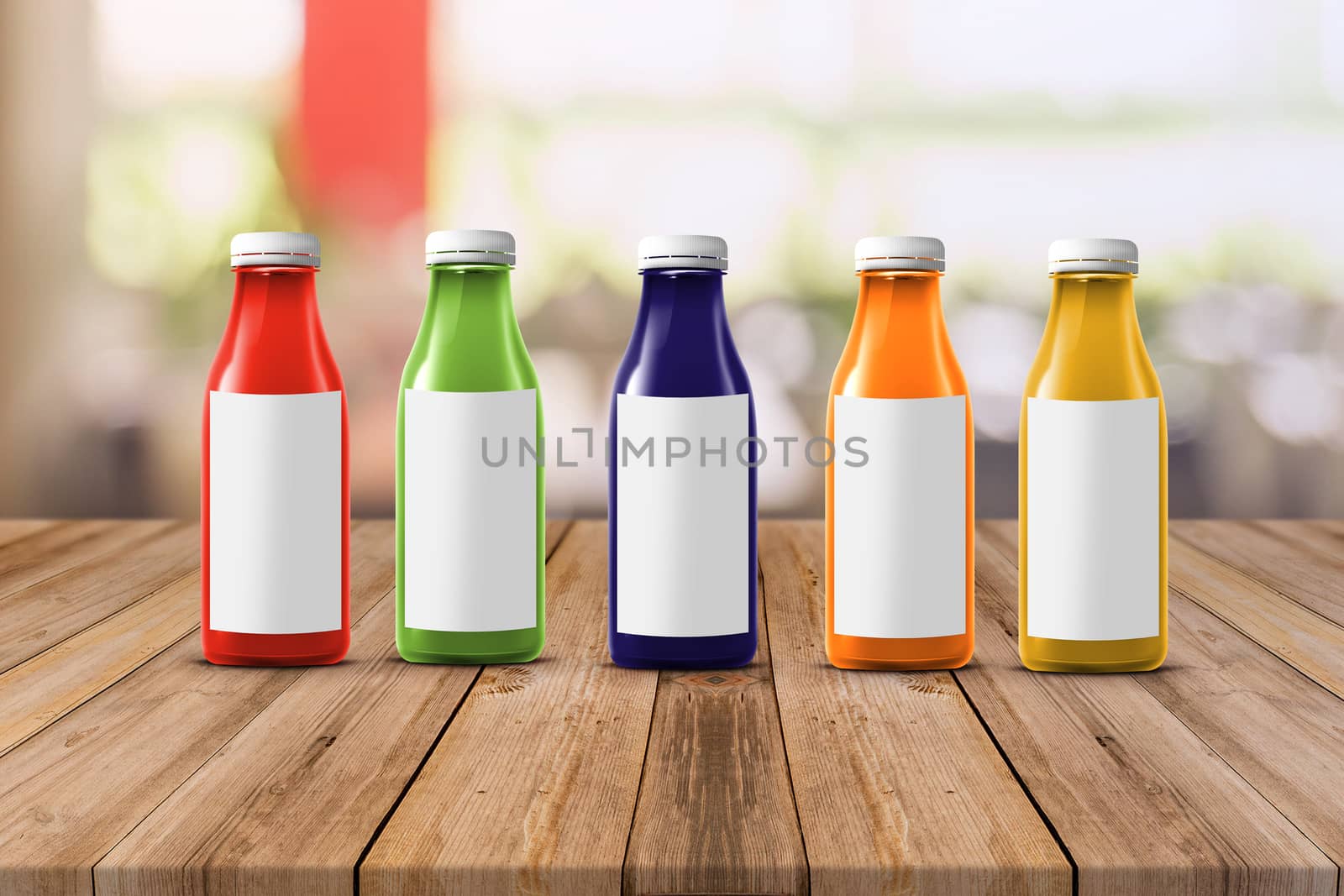 five multicolored bottles of juice are on the counter by boys1983@mail.ru