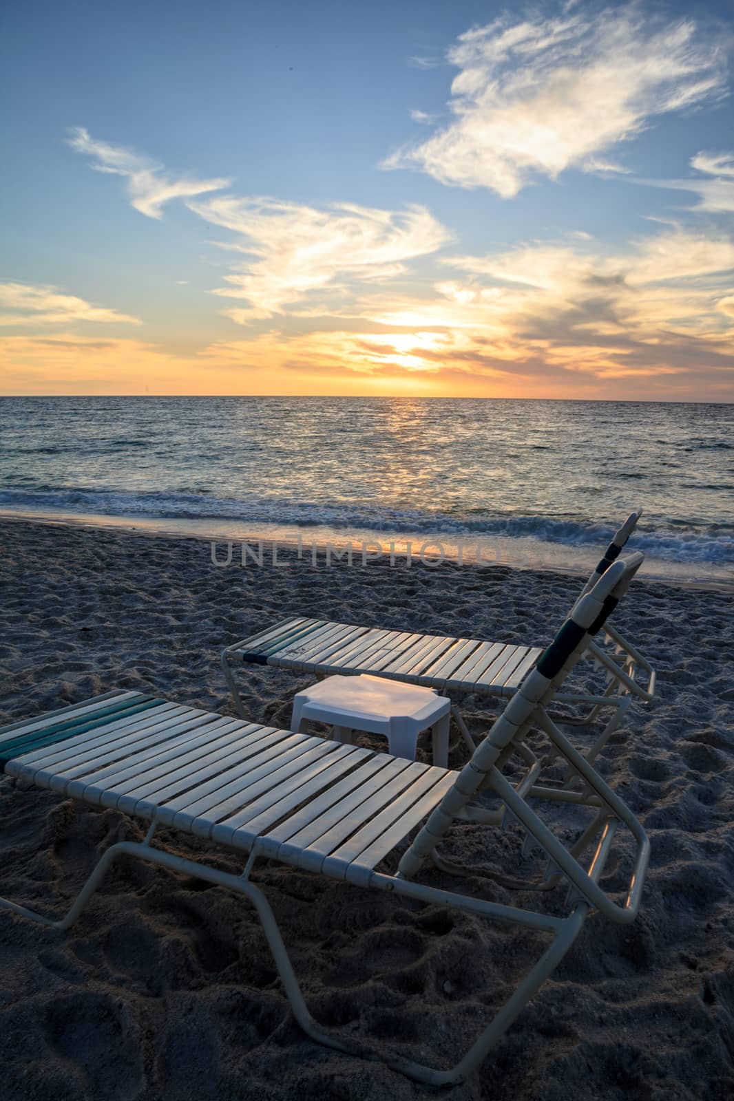 Chairs along Vanderbilt Beach in Naples, Florida by steffstarr