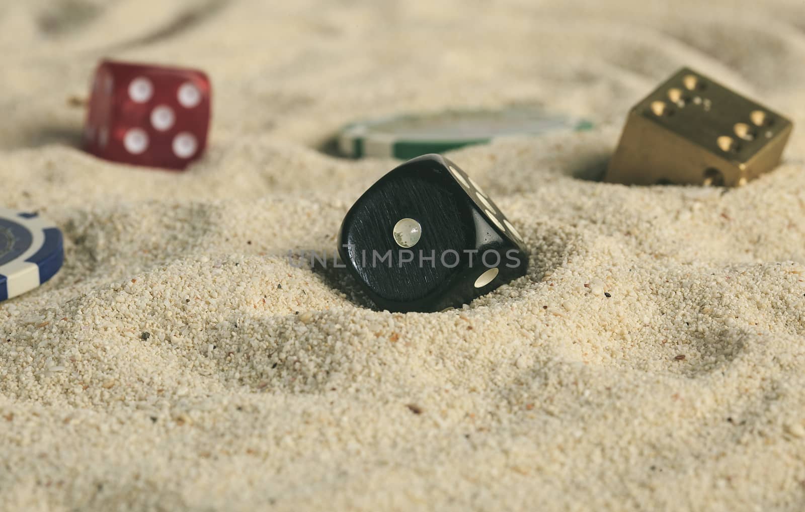 some dices in the sand dunes