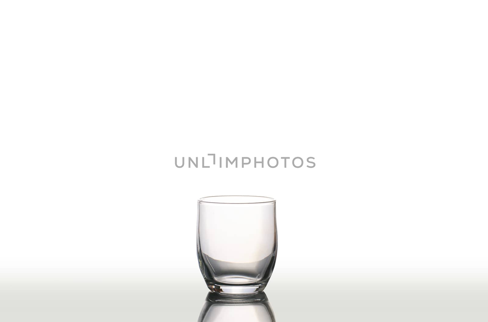Isolated glass  and cup of water