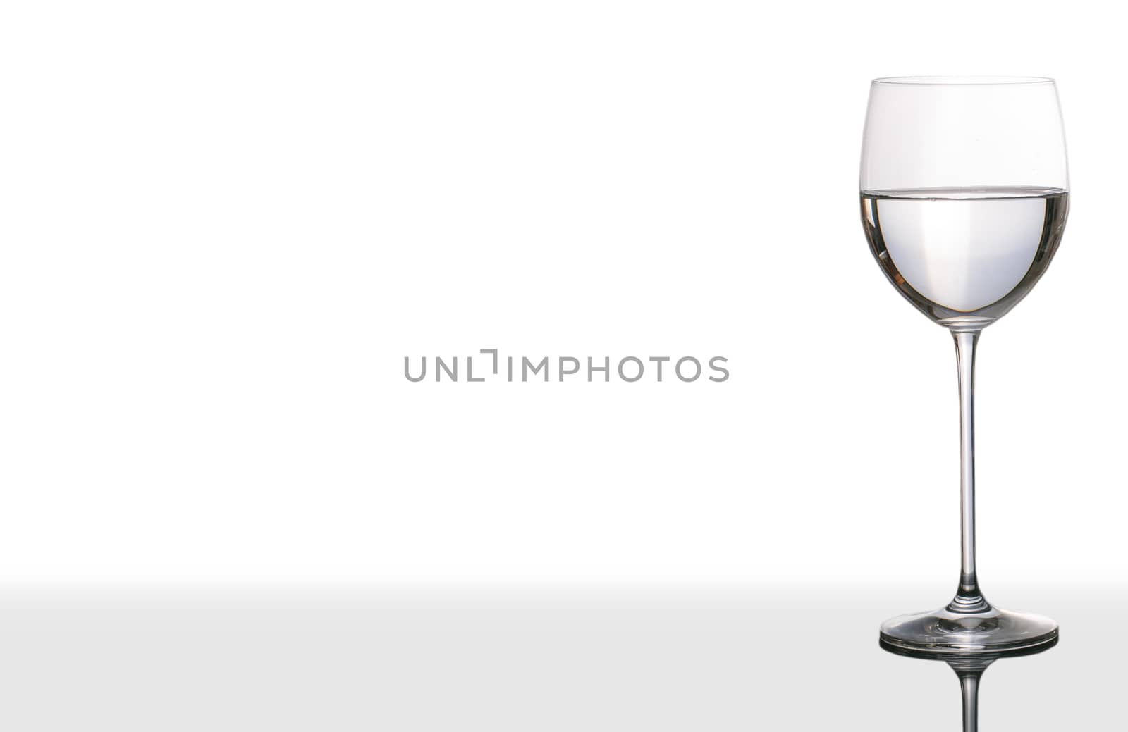 Isolated glass  and cup of water