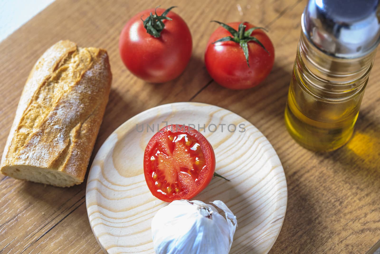 Tipical catalonial breakfast with bread,tomato and oil