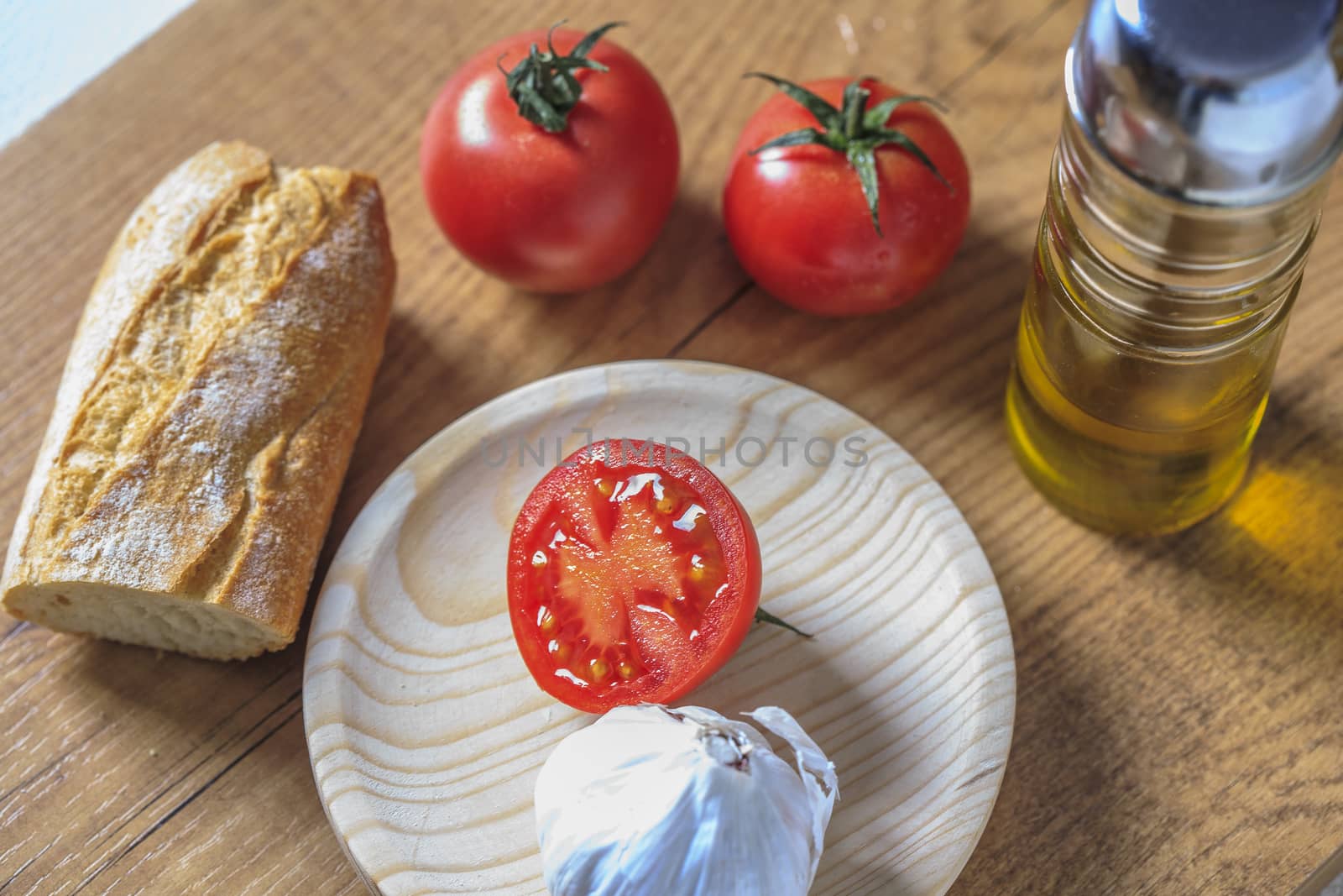 Tipical catalonial breakfast with bread,tomato and oil