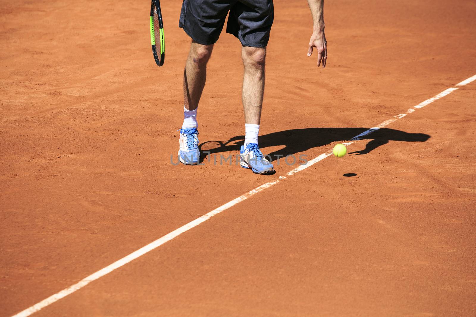 Tennis player ready to serve